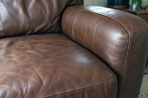 The same leather upholstery after professional cleaning